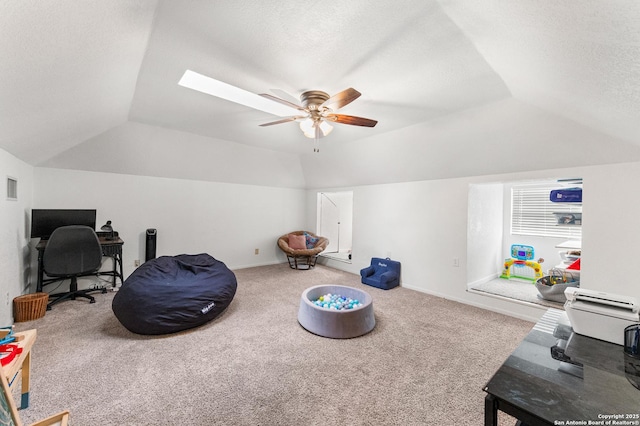 503 Lower Lacoste, Castroville, TX 78009 - rec room with baseboards, ceiling fan, carpet floors, and vaulted ceiling