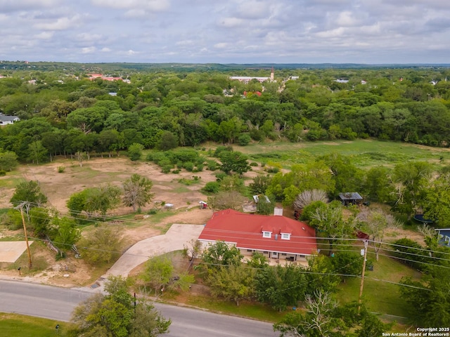 503 Lower Lacoste, Castroville, TX 78009 - drone / aerial view with a wooded view