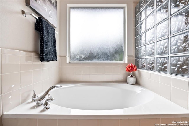 full bathroom with a bath