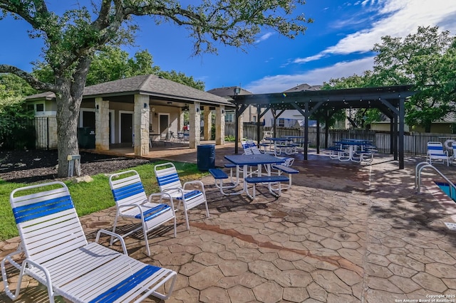 view of patio / terrace featuring a gazebo and fence