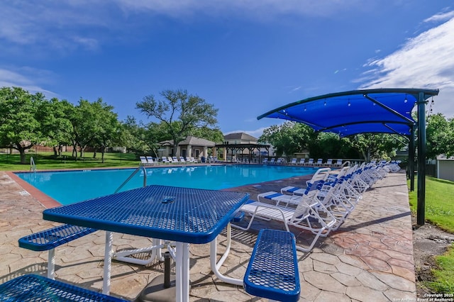 community pool featuring a patio