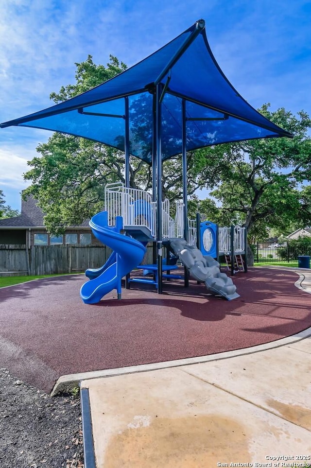 community playground featuring fence