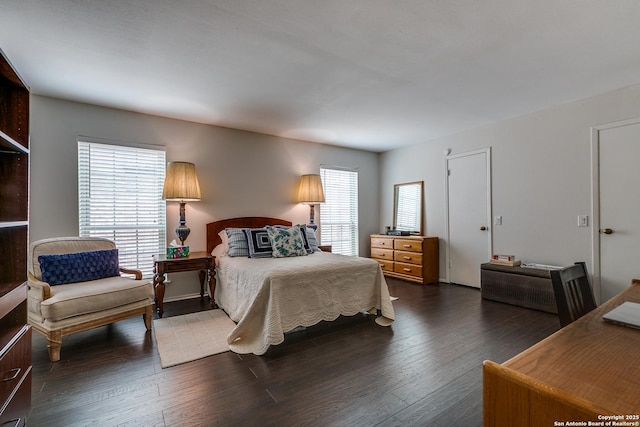 7500 Callaghan Rd Unit 172, San Antonio, TX 78229 - bedroom with dark wood-style flooring