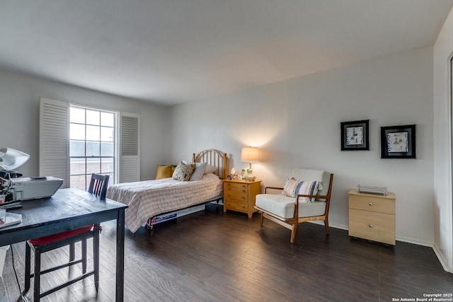 7500 Callaghan Rd Unit 172, San Antonio, TX 78229 - bedroom with dark wood-type flooring and baseboards