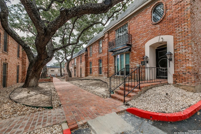 7500 Callaghan Rd Unit 172, San Antonio, TX 78229 - exterior space with a balcony and brick siding