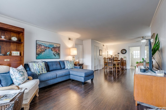 7500 Callaghan Rd Unit 172, San Antonio, TX 78229 - living area featuring ceiling fan, ornamental molding, visible vents, and dark wood-style floors