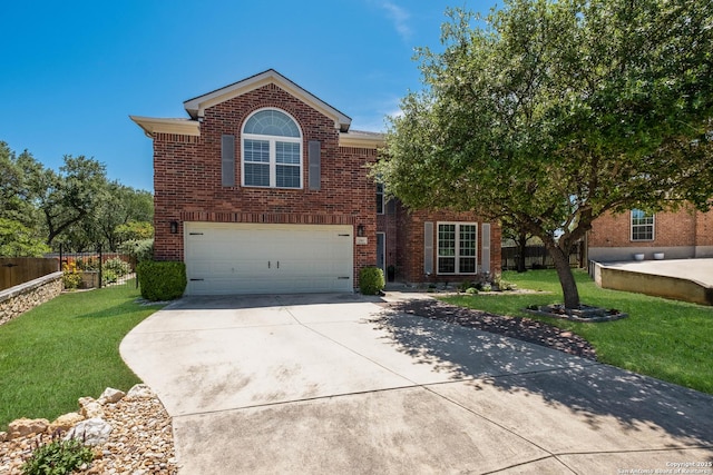 190 Da Vinci, San Antonio, TX 78258 - traditional-style house featuring brick siding, an attached garage, and concrete driveway