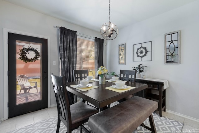 190 Da Vinci, San Antonio, TX 78258 - dining area with a chandelier, light tile patterned floors, and baseboards