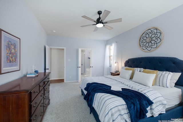 190 Da Vinci, San Antonio, TX 78258 - bedroom with light carpet, baseboards, a ceiling fan, and ensuite bath