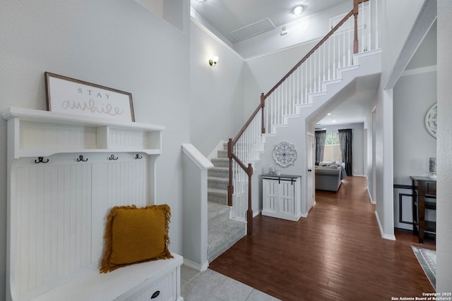 190 Da Vinci, San Antonio, TX 78258 - mudroom with wood finished floors, a towering ceiling, and baseboards