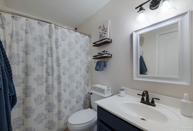 190 Da Vinci, San Antonio, TX 78258 - bathroom featuring vanity, toilet, and a shower with shower curtain