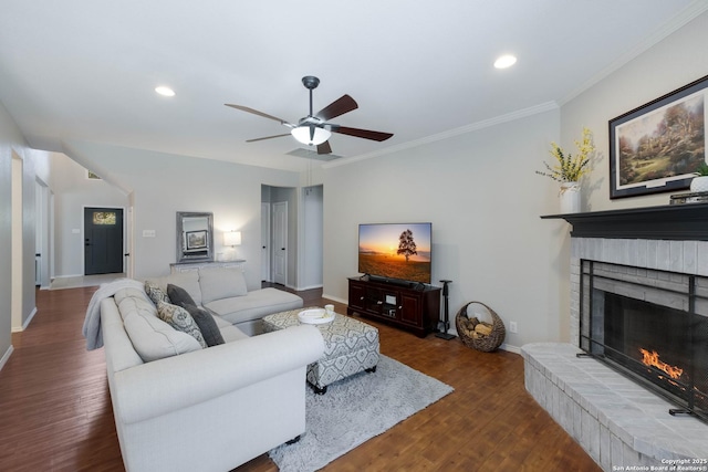190 Da Vinci, San Antonio, TX 78258 - living room with a brick fireplace, wood finished floors, ceiling fan, recessed lighting, and ornamental molding