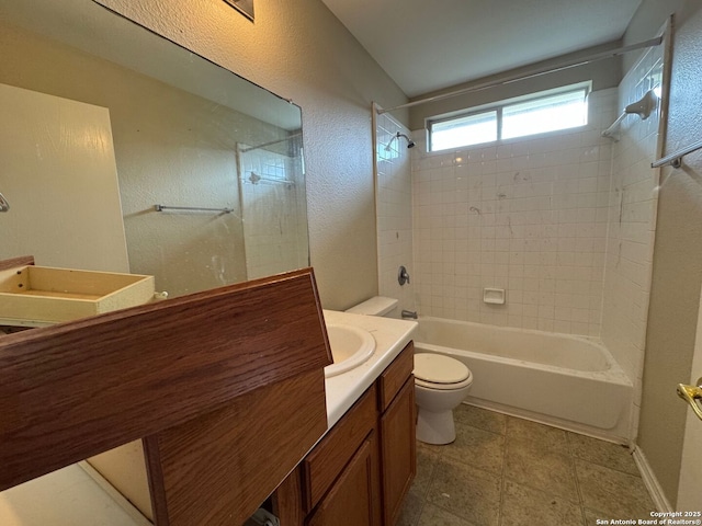 bathroom with vanity, toilet, and shower / bathtub combination