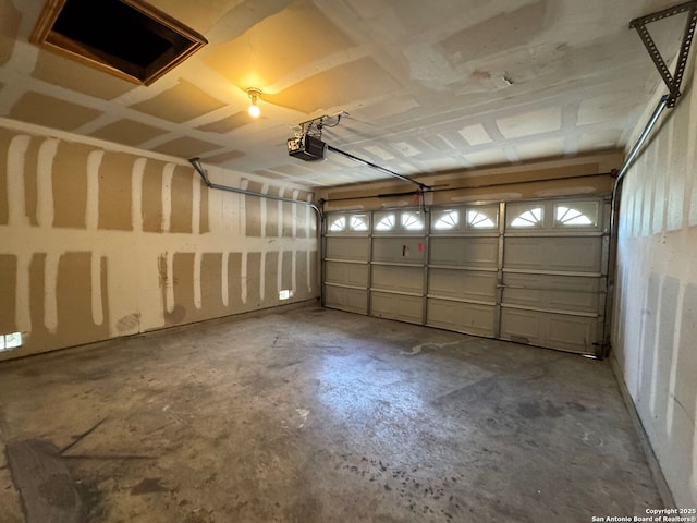 garage featuring a garage door opener