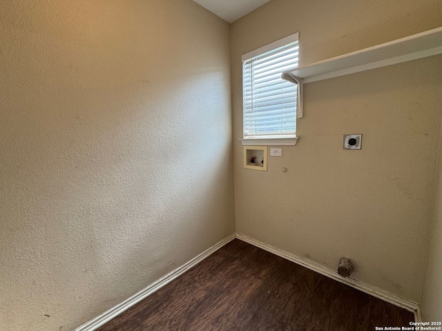 laundry room featuring laundry area, dark wood-style floors, electric dryer hookup, washer hookup, and baseboards