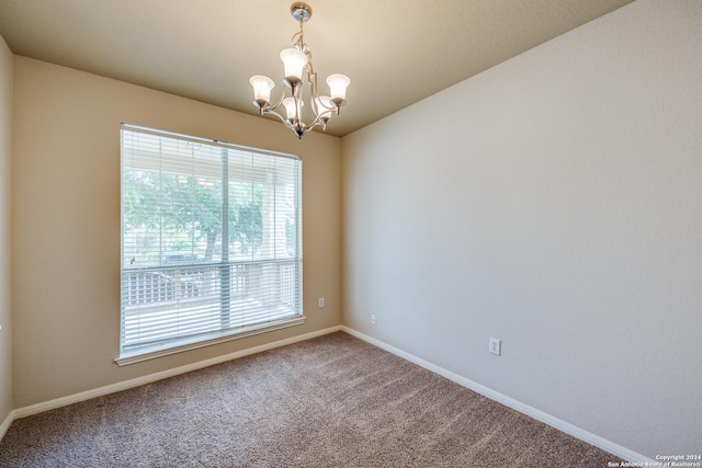 10603 Catfish Ln, San Antonio, TX 78224 - carpeted spare room with a chandelier and baseboards