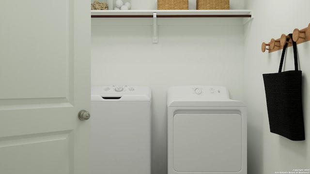 washroom featuring laundry area and independent washer and dryer