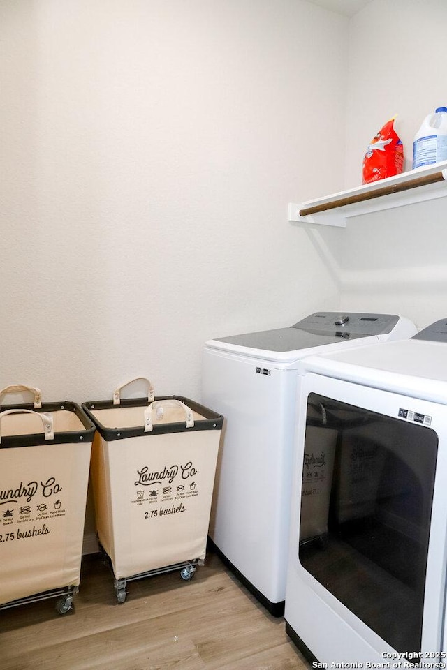 236/238 Joseph Cir, Cibolo, TX 78108 - laundry area with laundry area, light wood-style flooring, and washer and dryer