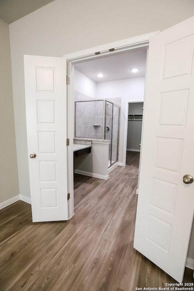 236/238 Joseph Cir, Cibolo, TX 78108 - hall featuring wood finished floors and baseboards