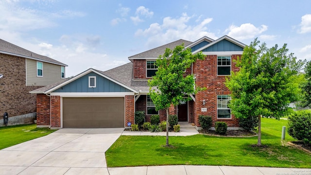 14626 Costa Leon, San Antonio, TX 78245 - view of front of home featuring board and batten siding, a garage, concrete driveway, a front yard, and roof with shingles