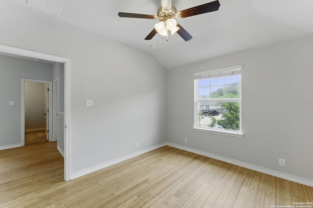 14626 Costa Leon, San Antonio, TX 78245 - empty room featuring baseboards, light wood finished floors, visible vents, and vaulted ceiling