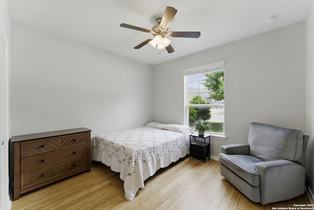 14626 Costa Leon, San Antonio, TX 78245 - bedroom featuring ceiling fan, baseboards, and light wood-type flooring