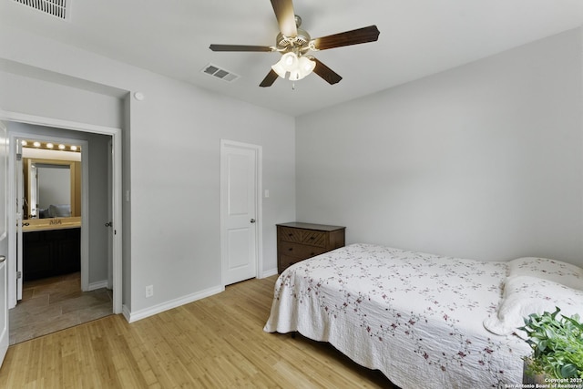 14626 Costa Leon, San Antonio, TX 78245 - bedroom with light wood-style flooring, baseboards, a ceiling fan, and visible vents