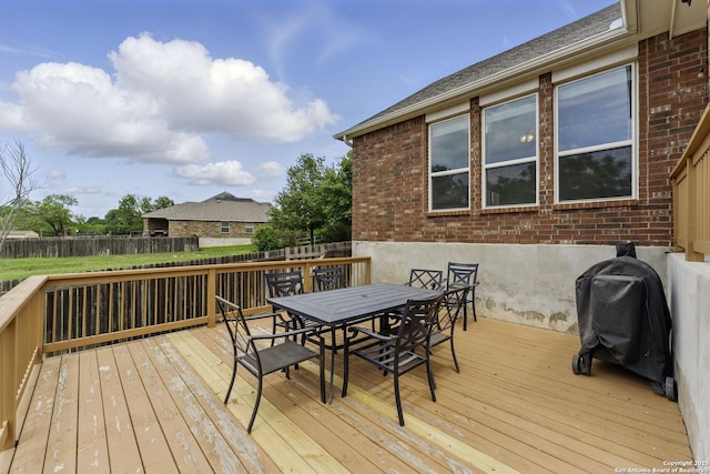 14626 Costa Leon, San Antonio, TX 78245 - deck with outdoor dining area, fence, and a grill