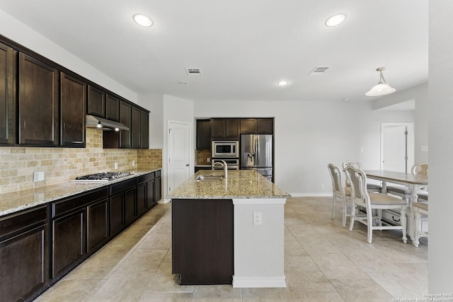 14626 Costa Leon, San Antonio, TX 78245 - kitchen with light stone countertops, recessed lighting, a sink, tasteful backsplash, and appliances with stainless steel finishes
