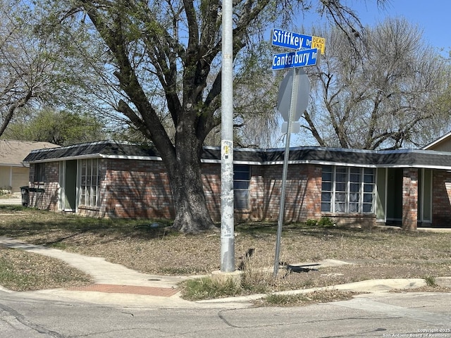 5738 Harefield, San Antonio, TX 78228 - view of property exterior featuring brick siding