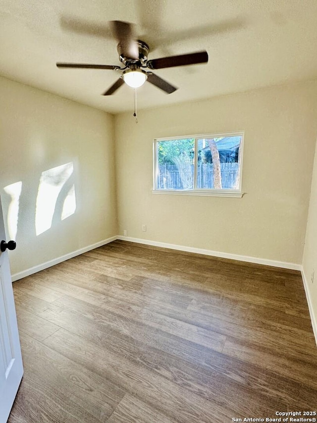 13243 Larkfield, San Antonio, TX 78233 - empty room featuring wood finished floors, baseboards, and ceiling fan