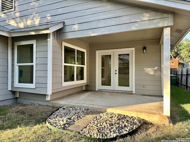 13243 Larkfield, San Antonio, TX 78233 - entrance to property with fence, french doors, a patio area, and visible vents