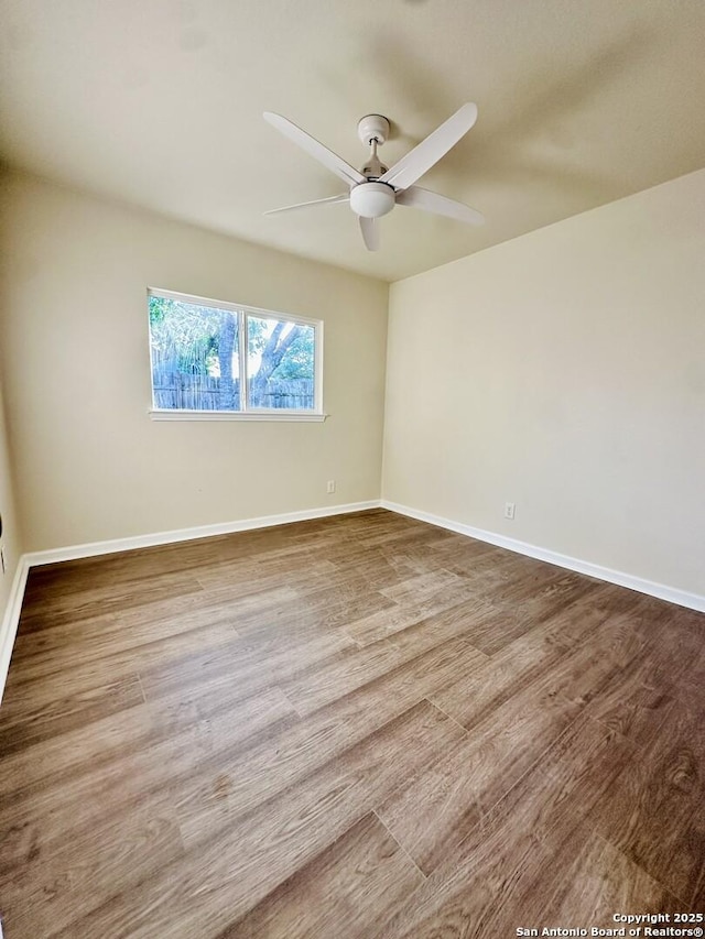 13243 Larkfield, San Antonio, TX 78233 - unfurnished room with a ceiling fan, baseboards, and wood finished floors