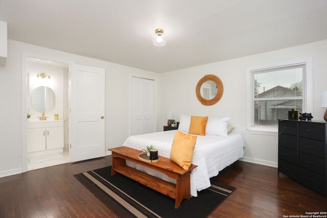 308 Andrews, San Antonio, TX 78209 - bedroom with a closet, ensuite bath, baseboards, and hardwood / wood-style flooring