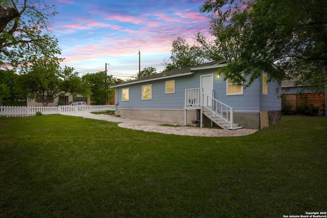 308 Andrews, San Antonio, TX 78209 - back of property with fence and a lawn