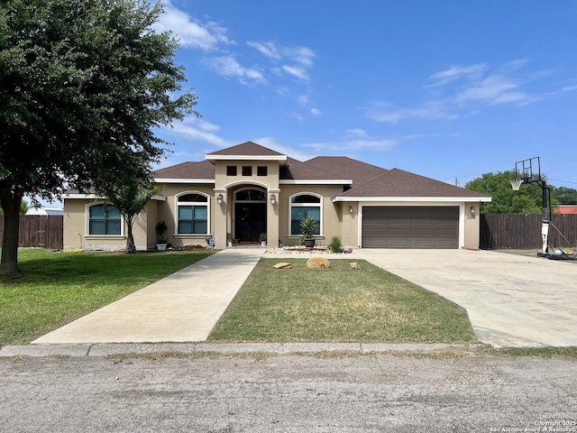 mediterranean / spanish-style house with fence and stucco siding