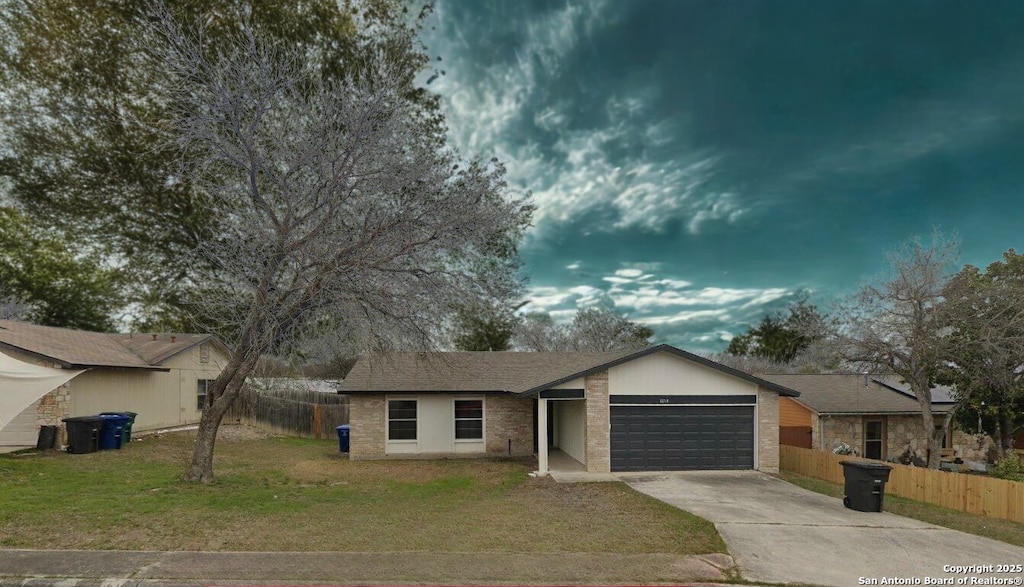 ranch-style house with a garage, driveway, and brick siding