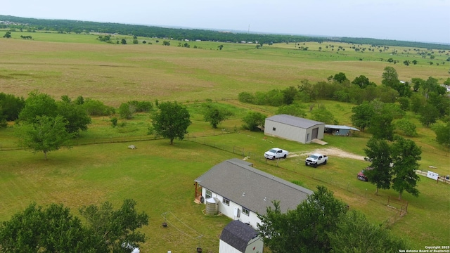 birds eye view of property featuring a rural view