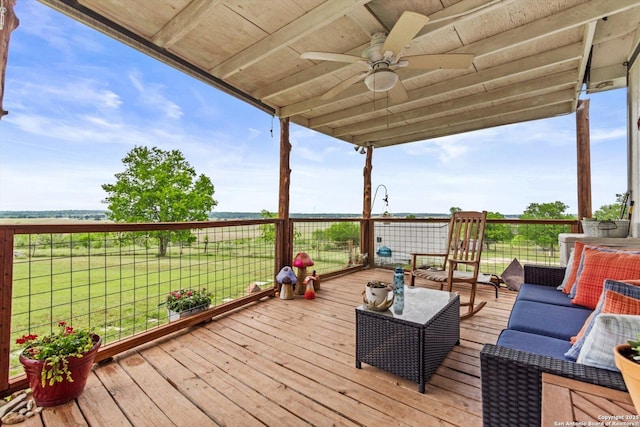 deck with an outdoor hangout area and ceiling fan