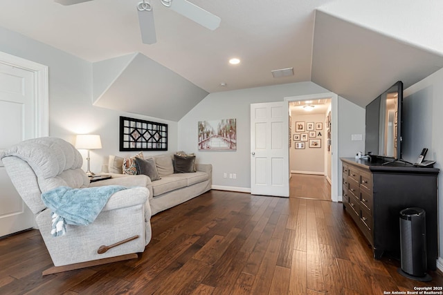 living room featuring visible vents, vaulted ceiling, dark wood-style flooring, a ceiling fan, and baseboards