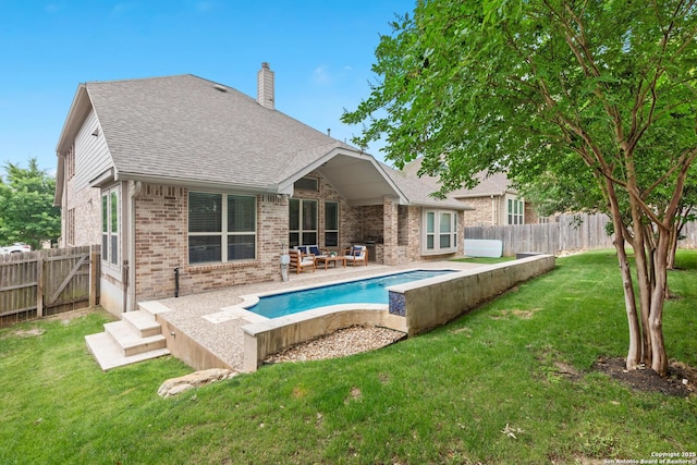 back of house with brick siding, a chimney, roof with shingles, a patio, and an outdoor hangout area