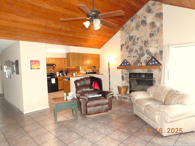 525 Cherry Rdg, Floresville, TX 78114 - living area featuring wooden ceiling, light tile patterned flooring, a ceiling fan, high vaulted ceiling, and a stone fireplace