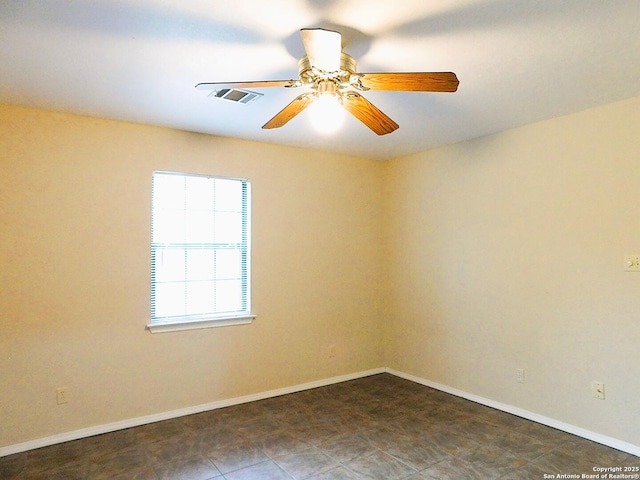 525 Cherry Rdg, Floresville, TX 78114 - unfurnished room with ceiling fan and baseboards