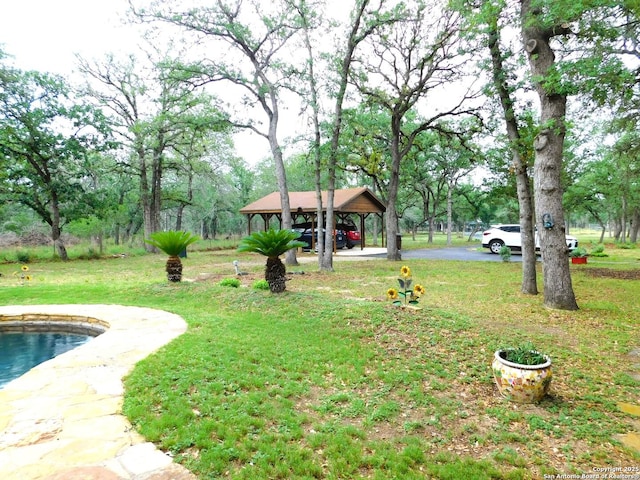 525 Cherry Rdg, Floresville, TX 78114 - view of green lawn featuring a gazebo and a detached carport