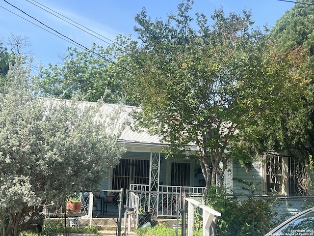 238 Lone Star, San Antonio, TX 78204 - back of house with a porch and metal roof