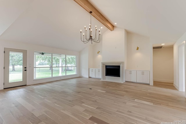 7335 Scintilla Ln, Boerne, TX 78015 - unfurnished living room with beamed ceiling, a chandelier, healthy amount of natural light, light wood-type flooring, and high vaulted ceiling