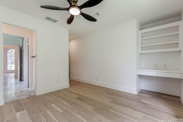7335 Scintilla Ln, Boerne, TX 78015 - empty room featuring ceiling fan, light wood finished floors, and baseboards