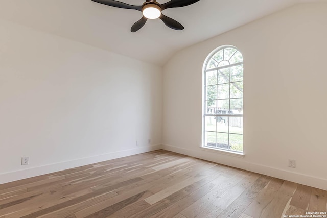 7335 Scintilla Ln, Boerne, TX 78015 - empty room featuring lofted ceiling, light wood finished floors, a ceiling fan, and baseboards
