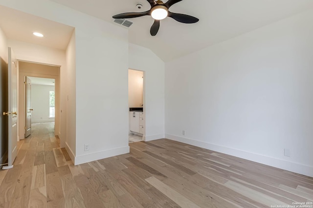 7335 Scintilla Ln, Boerne, TX 78015 - spare room featuring ceiling fan, light wood-style floors, baseboards, and vaulted ceiling