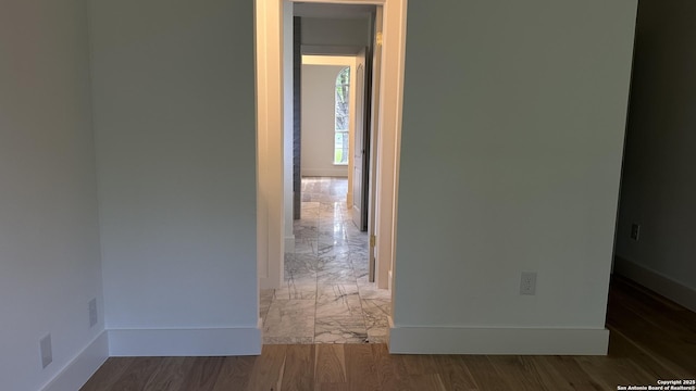 7335 Scintilla Ln, Boerne, TX 78015 - hallway with baseboards and marble finish flooring